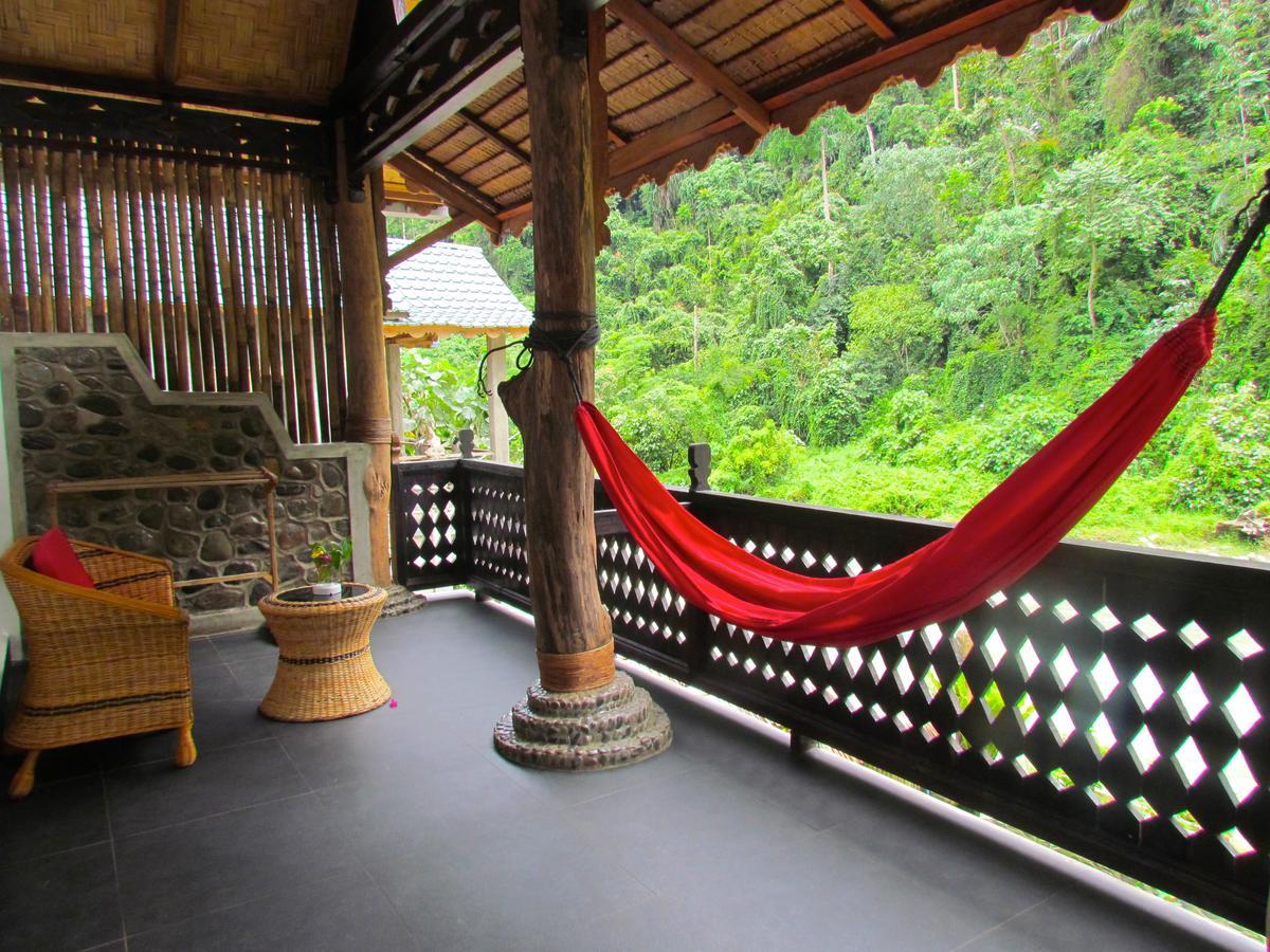 Ecotravel Cottages Bukit Lawang Exterior foto